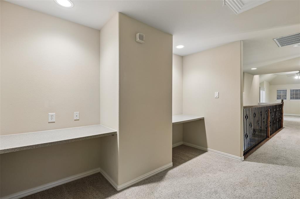 295 Stone Ridge Drive Sunnyvale, TX 75182 - Photo 22 of 38 upstairs hallway w built in desks lvl 2