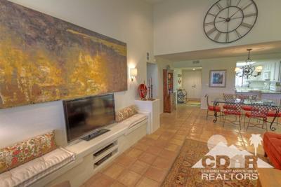 31 Medina Way Rancho Mirage, CA 92270 - Photo 1 of 25 a living room with fireplace furniture and a flat screen tv