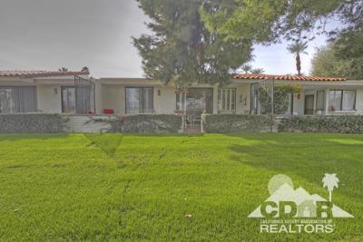 31 Medina Way Rancho Mirage, CA 92270 - Photo 13 of 25 a front view of a house with a garden