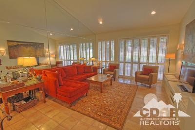 31 Medina Way Rancho Mirage, CA 92270 - Photo 3 of 25 a living room with furniture and a large window