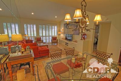 31 Medina Way Rancho Mirage, CA 92270 - Photo 5 of 25 a living room with lots of furniture and chandelier
