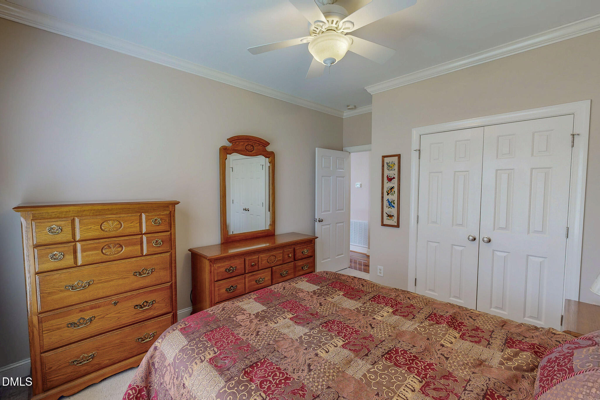 115 Duncan Plantation Road Timberlake, NC 27583 - Photo 35 of 48 a bedroom with a bed and a dresser