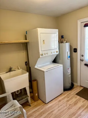 a utility room with dryer and washer