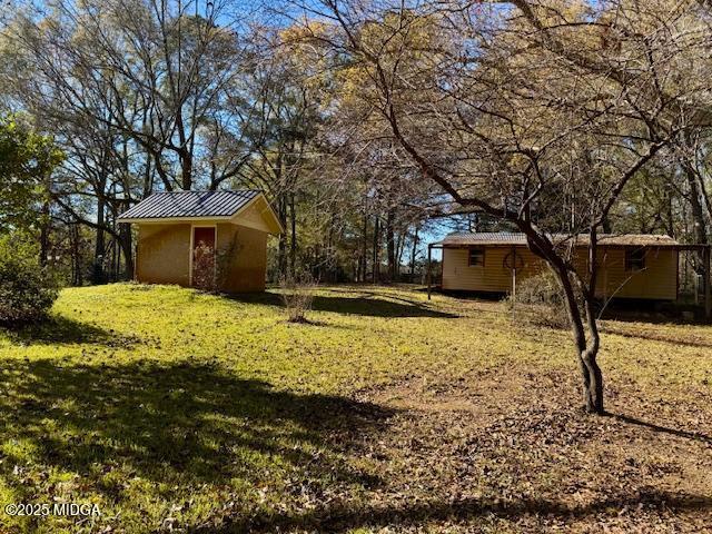 66 Quail Trail Juliette, GA 31046 - Photo 21 of 25 a view of a house with a yard