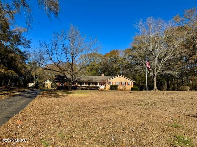 66 Quail Trail Juliette, GA 31046 - Photo 25 of 25 a view of road with large trees