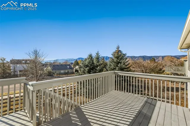 a view of a wooden roof with city view