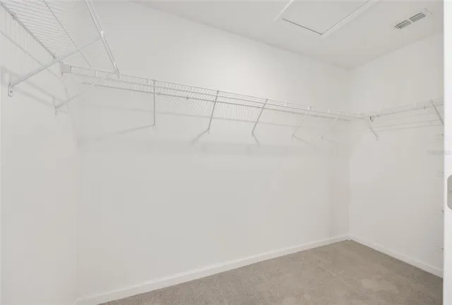 a view of a room with racks on the wall