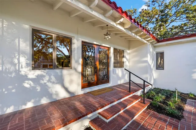 a bed room with a bed and a desk