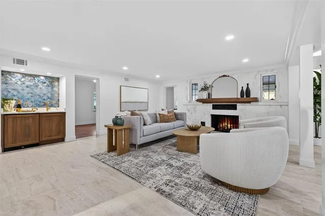 a bathroom with a sink a mirror and a toilet