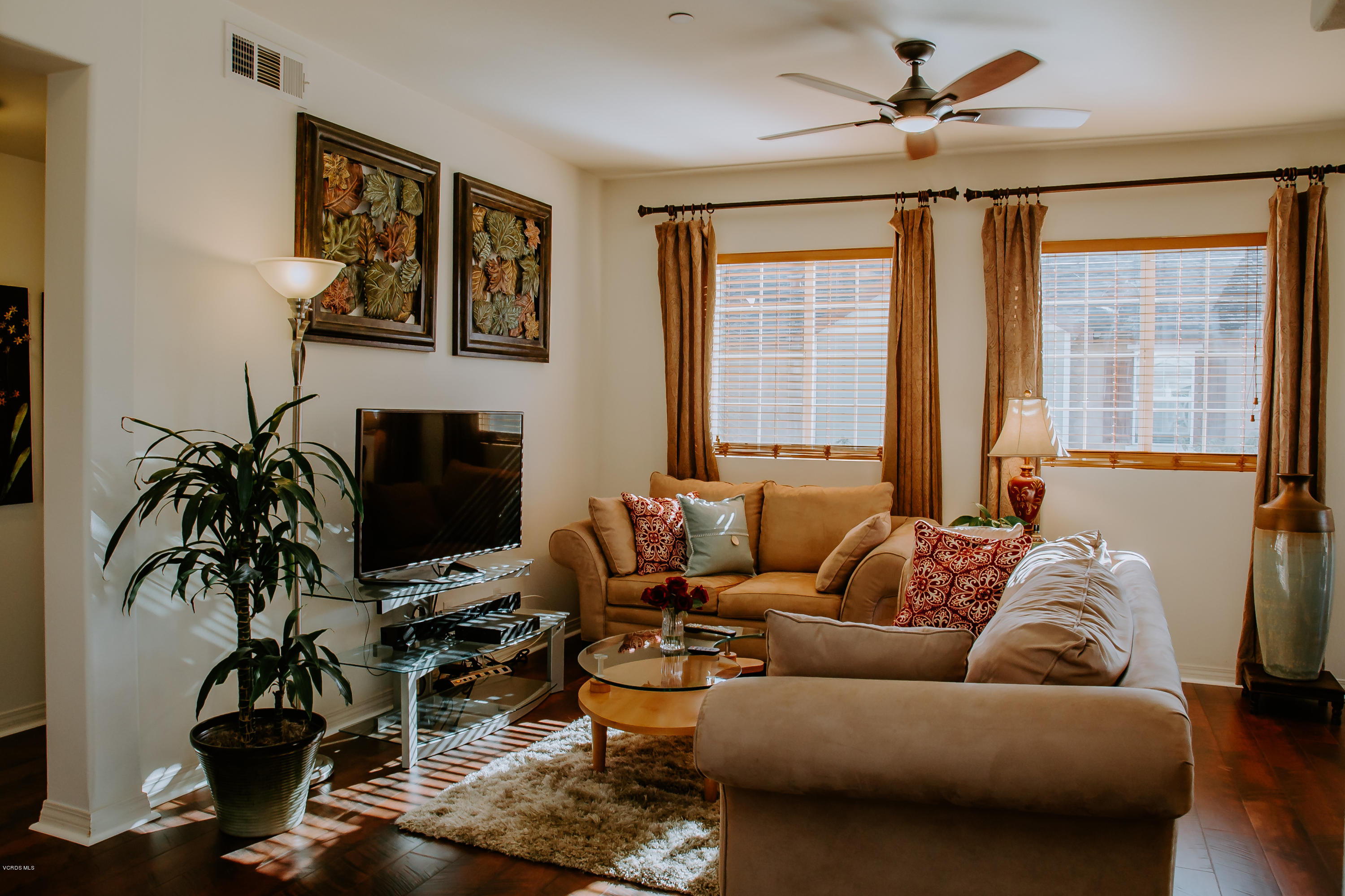3012 Moonlight Park Avenue Oxnard, CA 93036 - Photo 15 of 59 a living room with furniture and a flat screen tv
