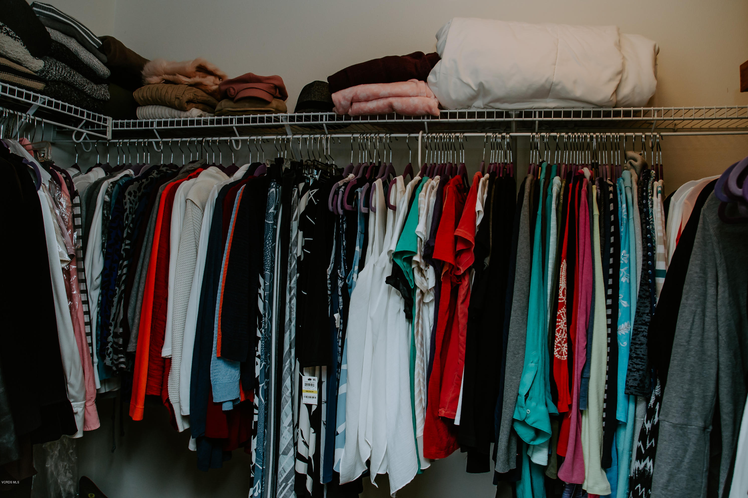 3012 Moonlight Park Avenue Oxnard, CA 93036 - Photo 38 of 59 a view of walk in closet with clothes