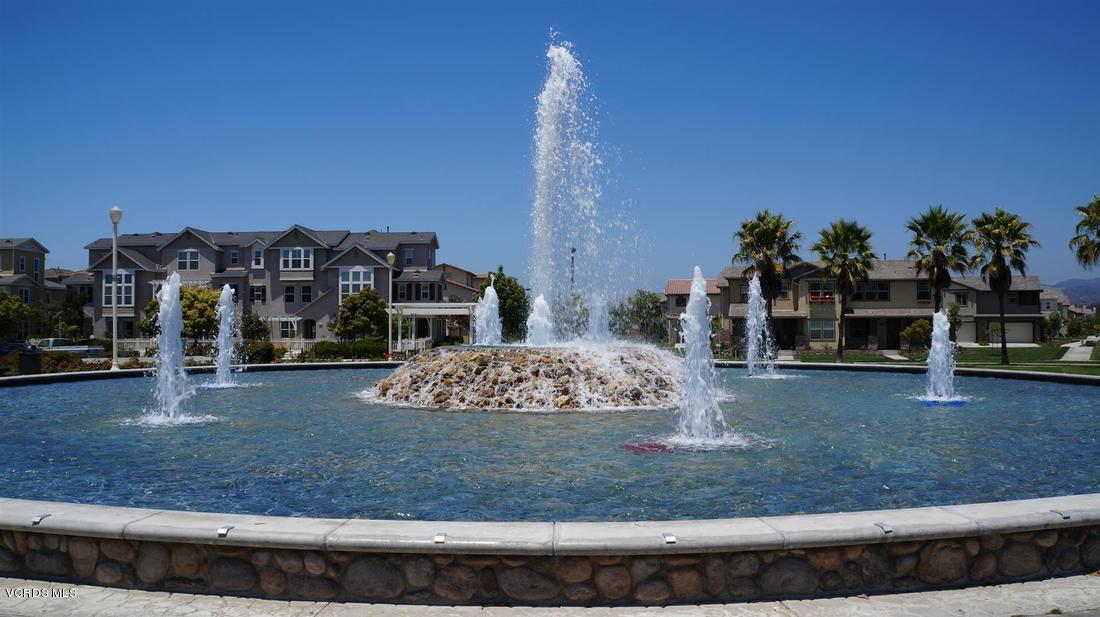 3012 Moonlight Park Avenue Oxnard, CA 93036 - Photo 45 of 59 a large building with a view of a yard
