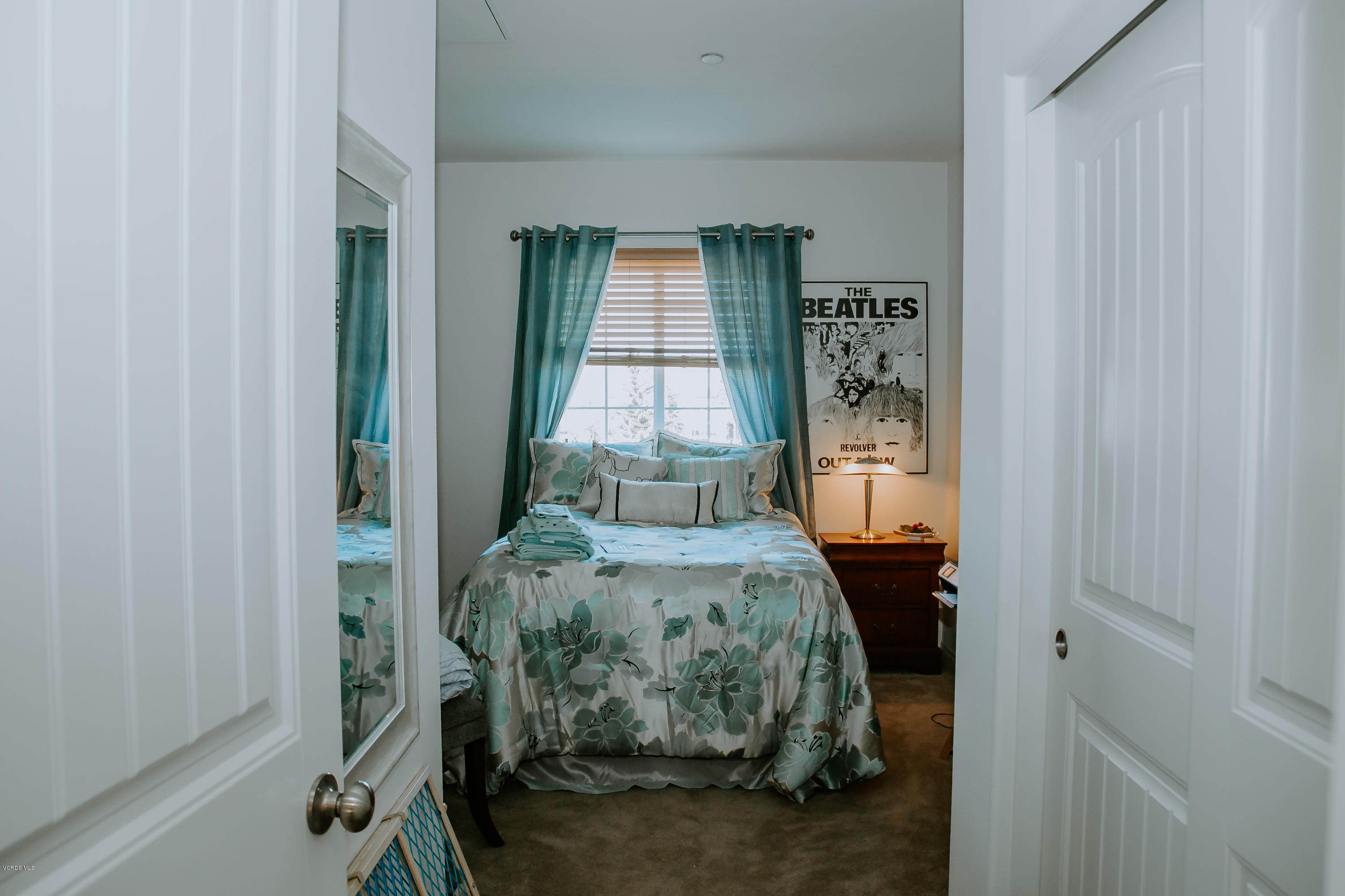 3012 Moonlight Park Avenue Oxnard, CA 93036 - Photo 10 of 59 a bedroom with a bed and a window