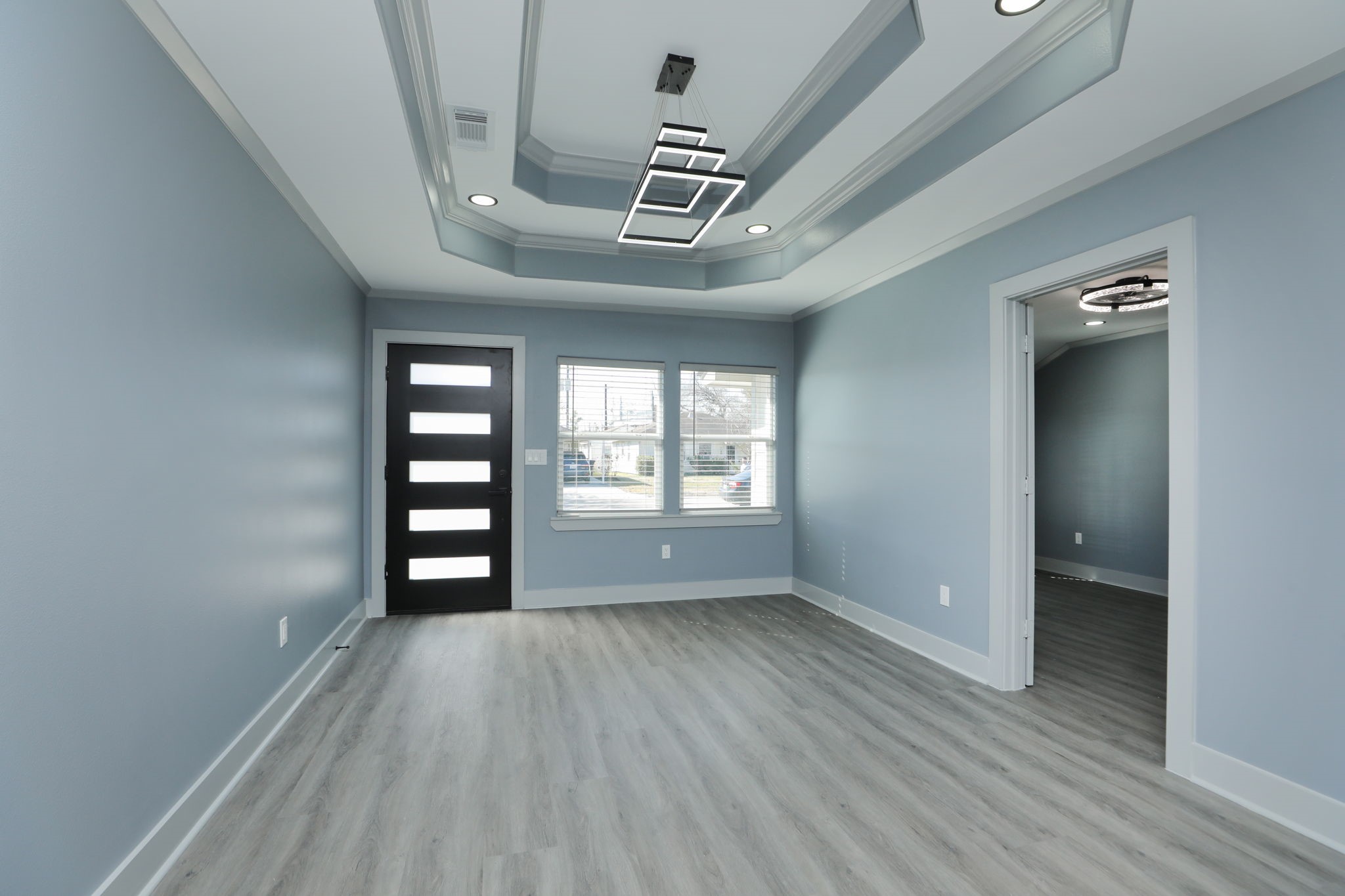 4047 Juliet Street Houston, TX 77087 - Photo 7 of 38 wooden floor in an empty room with a window