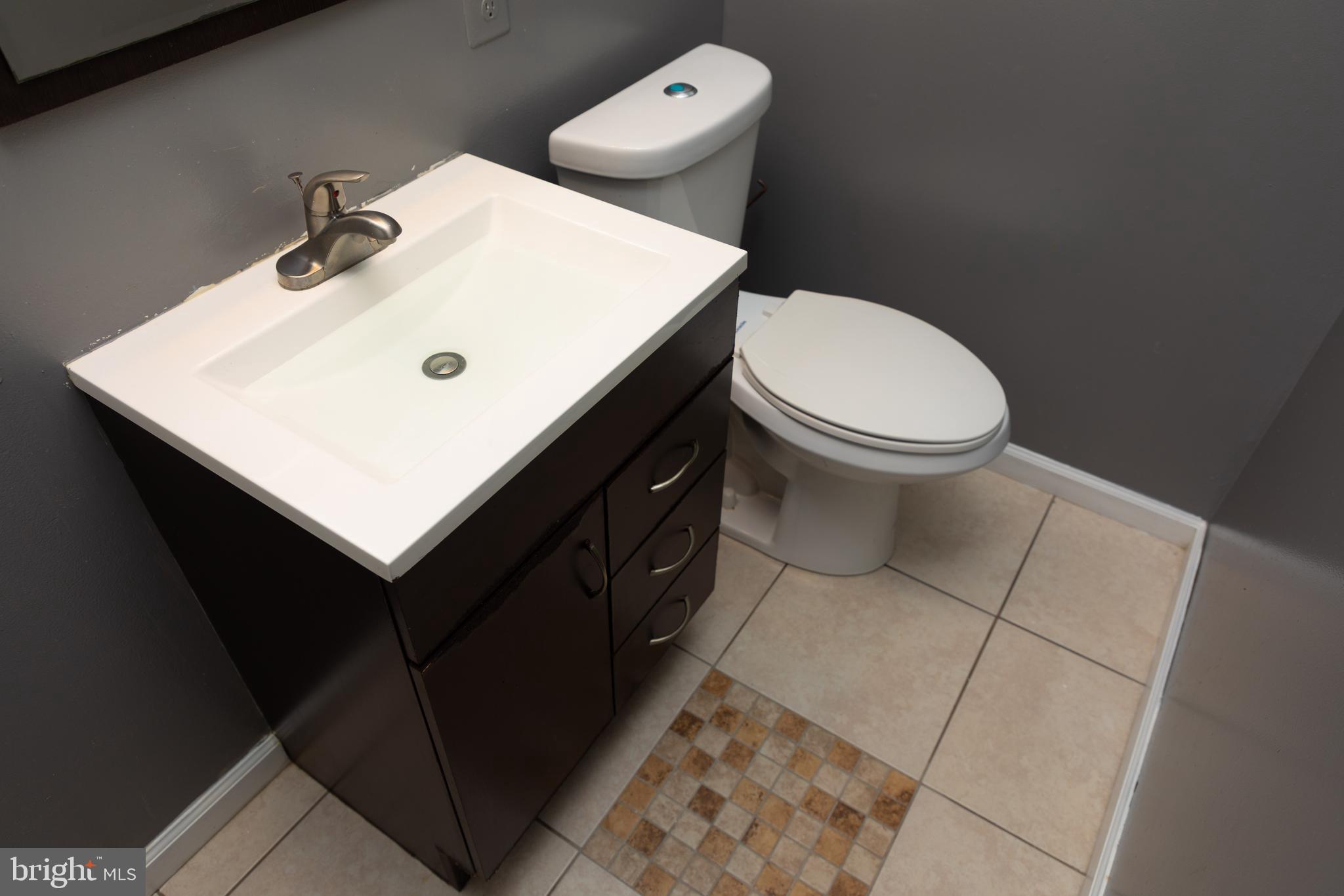 4110 West Cold Spring Lane Baltimore, MD 21215 - Photo 12 of 38 Main Level Powder Room