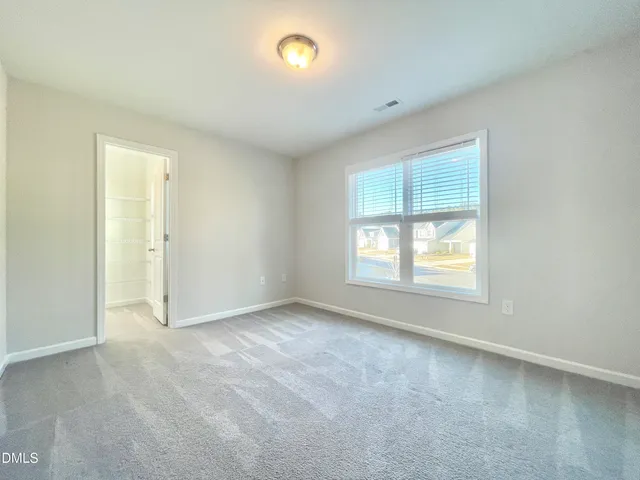 an empty room with an entryway