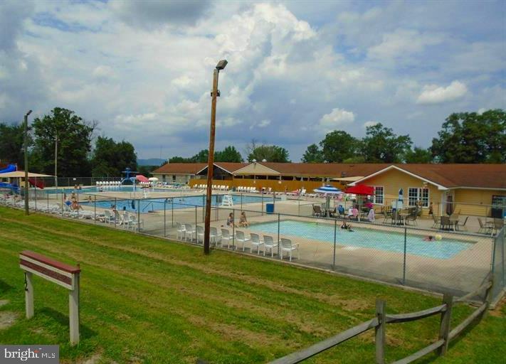 10 Block Deadwood Drive Falling Waters, WV 25419 - Photo 6 of 6 a view of a terrace with chairs