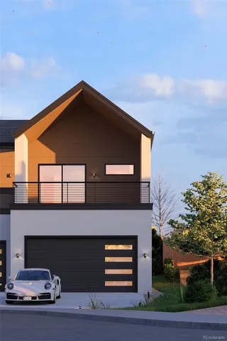 a front view of a house with garage