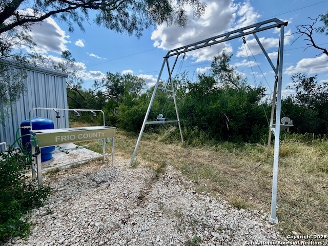 Ih Ih 35th Moore, TX 78057 - Photo 17 of 22 a backyard of a house with lots of green space and plants