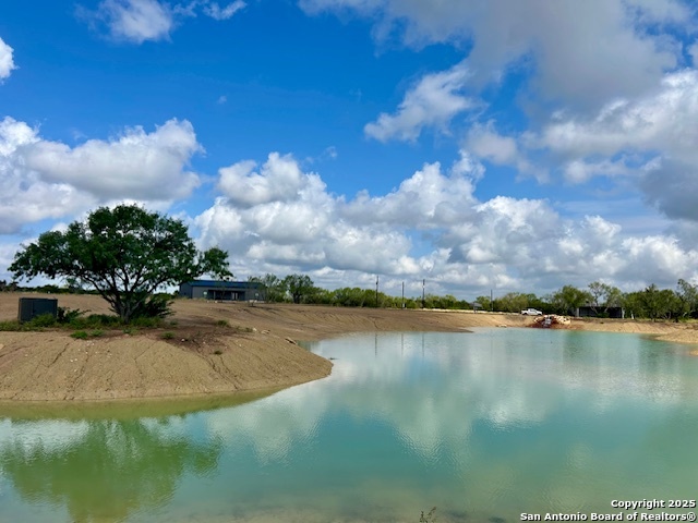 Ih Ih 35th Moore, TX 78057 - Photo 18 of 22 a view of a lake with houses in the background