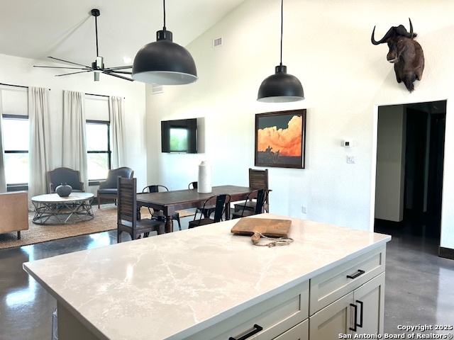 Ih Ih 35th Moore, TX 78057 - Photo 8 of 22 a kitchen with stainless steel appliances a stove a sink a dining table and chairs with wooden floor