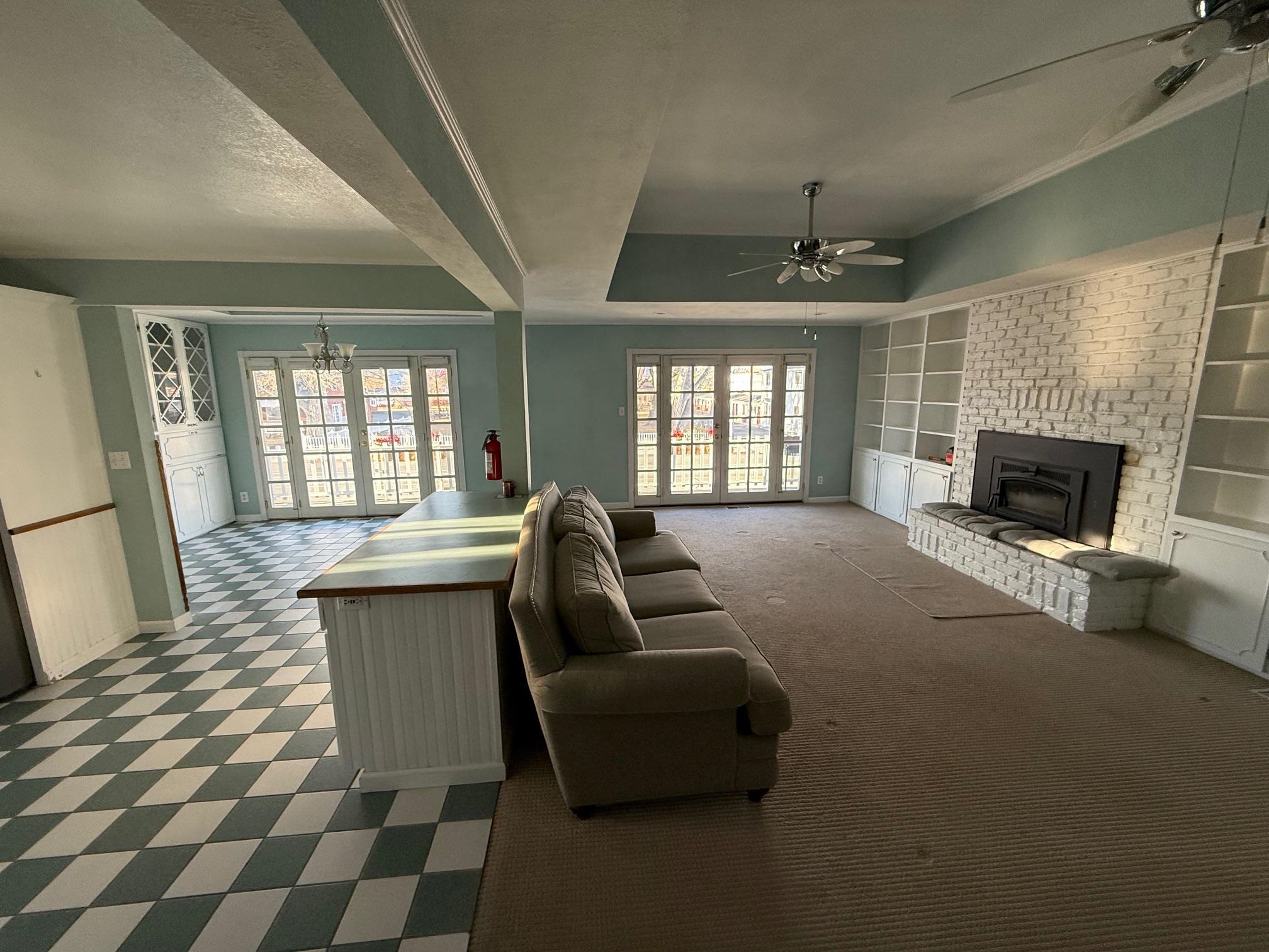 323 Main Street Bridgeport, CA 93517 - Photo 11 of 38 a living room with furniture and a fireplace