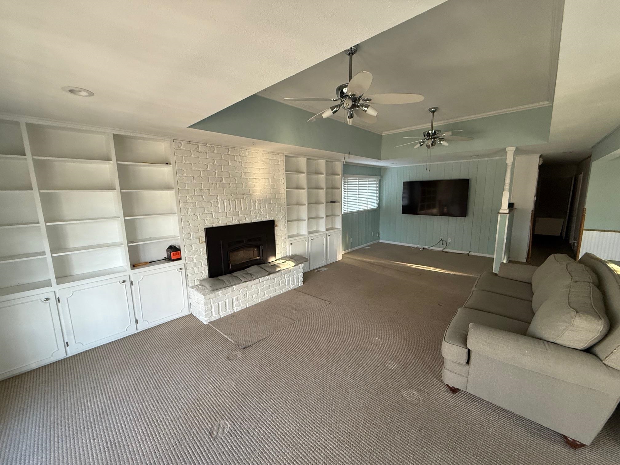 323 Main Street Bridgeport, CA 93517 - Photo 12 of 38 a living room with furniture and a flat screen tv