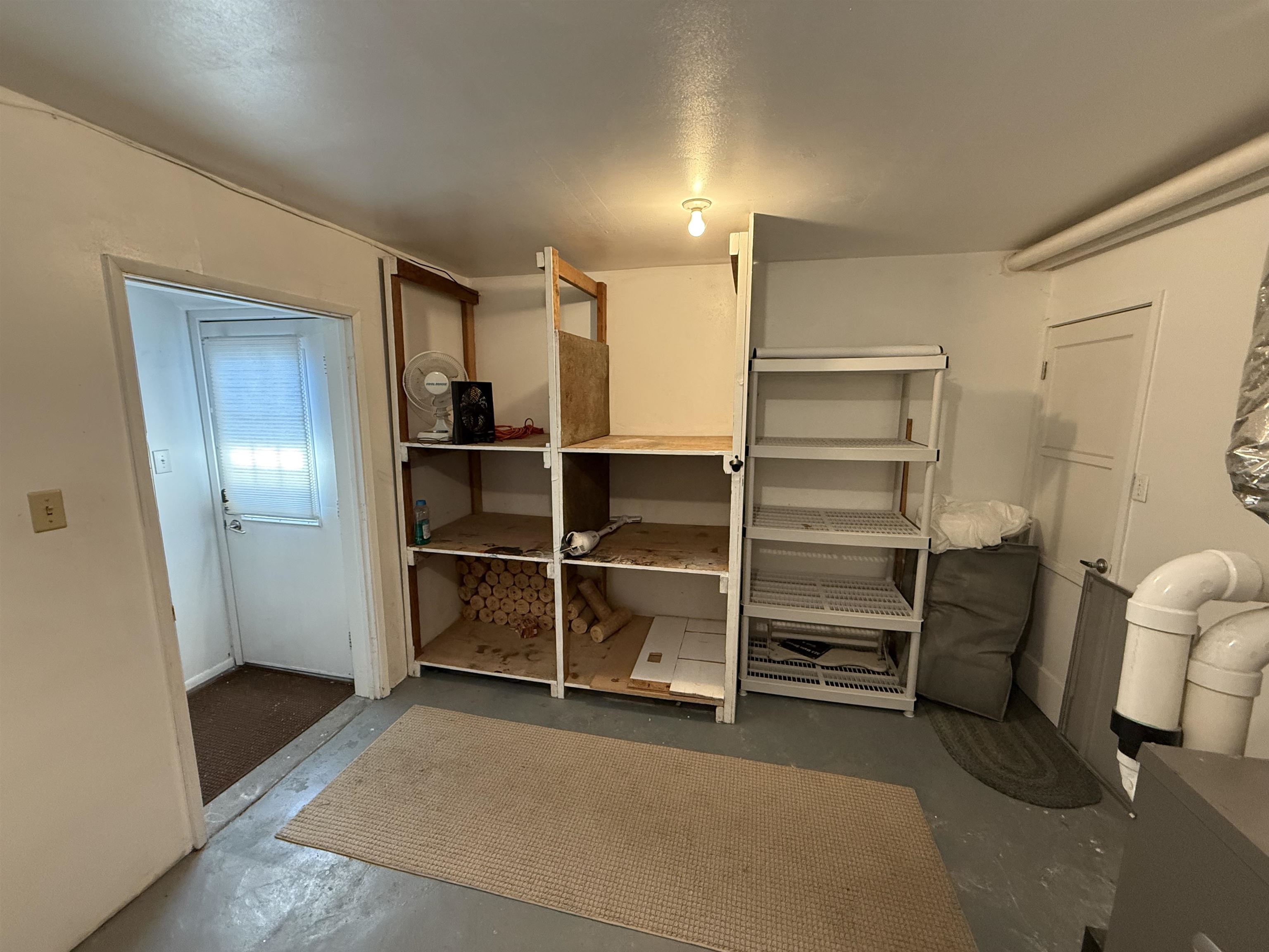 323 Main Street Bridgeport, CA 93517 - Photo 18 of 38 a room with walk in closet and a window