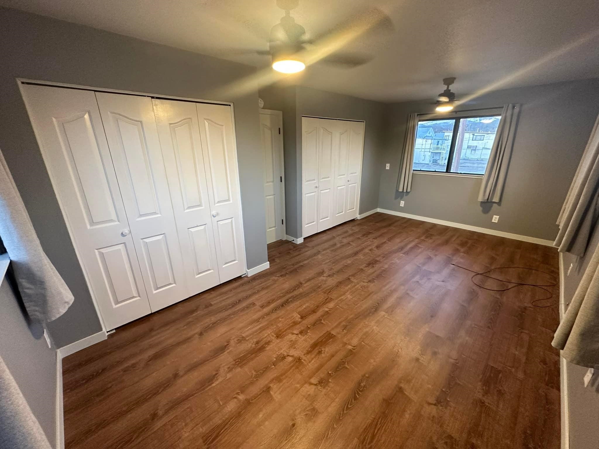 323 Main Street Bridgeport, CA 93517 - Photo 25 of 38 a view of empty room with window and wooden floor