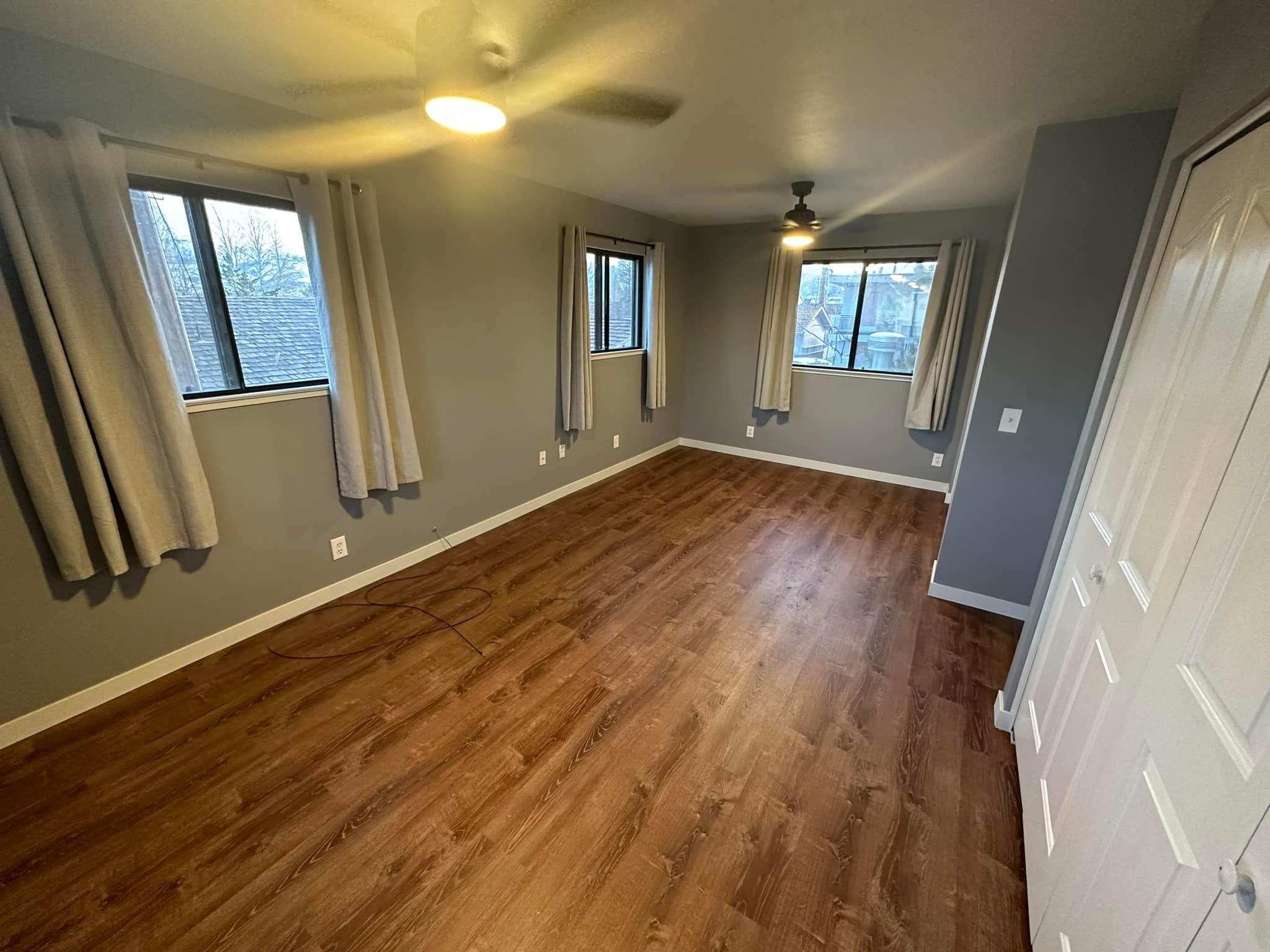 323 Main Street Bridgeport, CA 93517 - Photo 26 of 38 a view of an empty room with wooden floor and a window