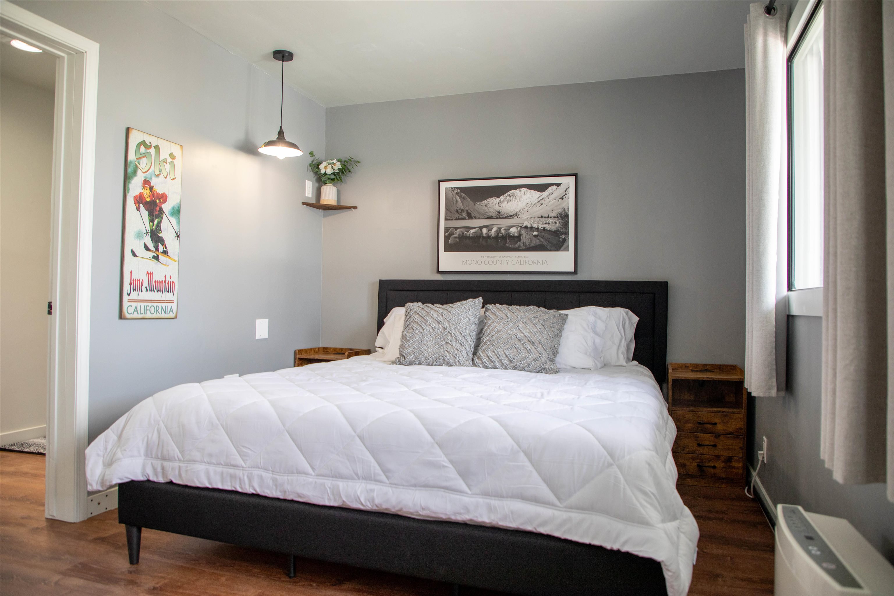 323 Main Street Bridgeport, CA 93517 - Photo 33 of 38 a bedroom with a bed and a painting on the wall