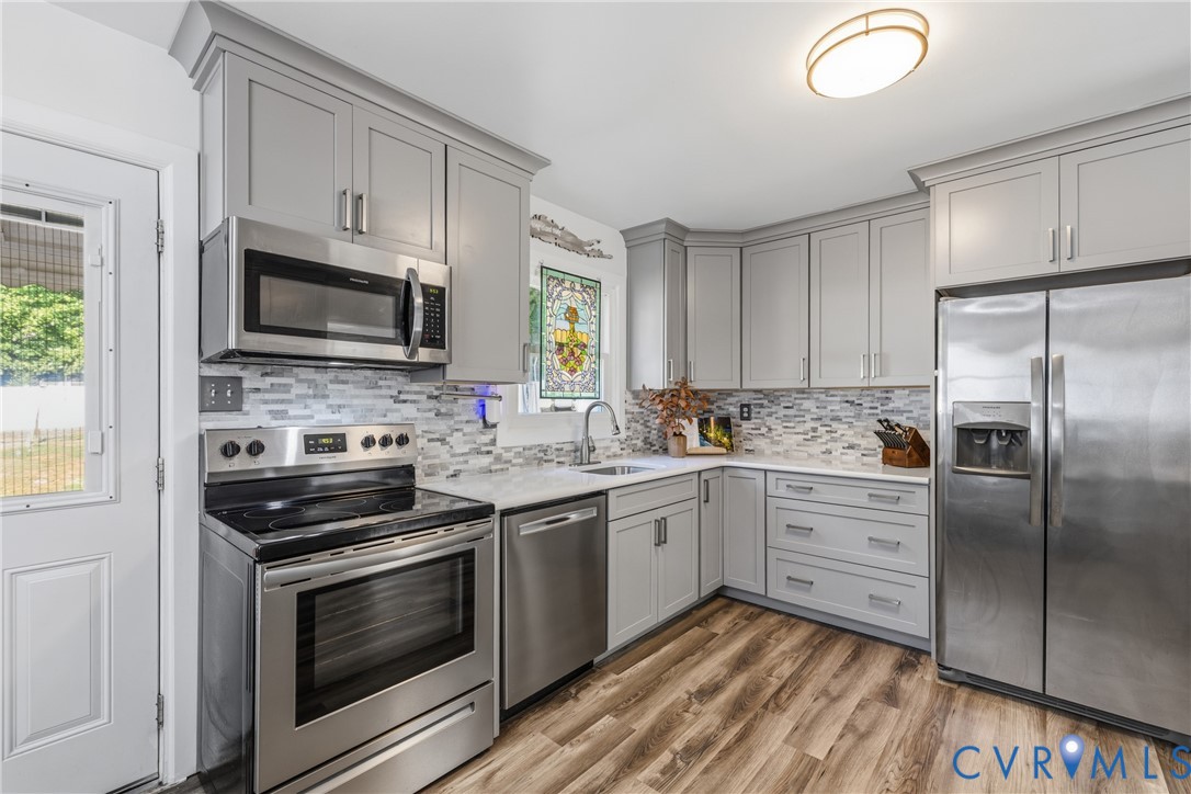 5112 Rollingway Road Chesterfield, VA 23832 - Photo 5 of 24 Quartz countertops, beautiful cabinetry, abundant