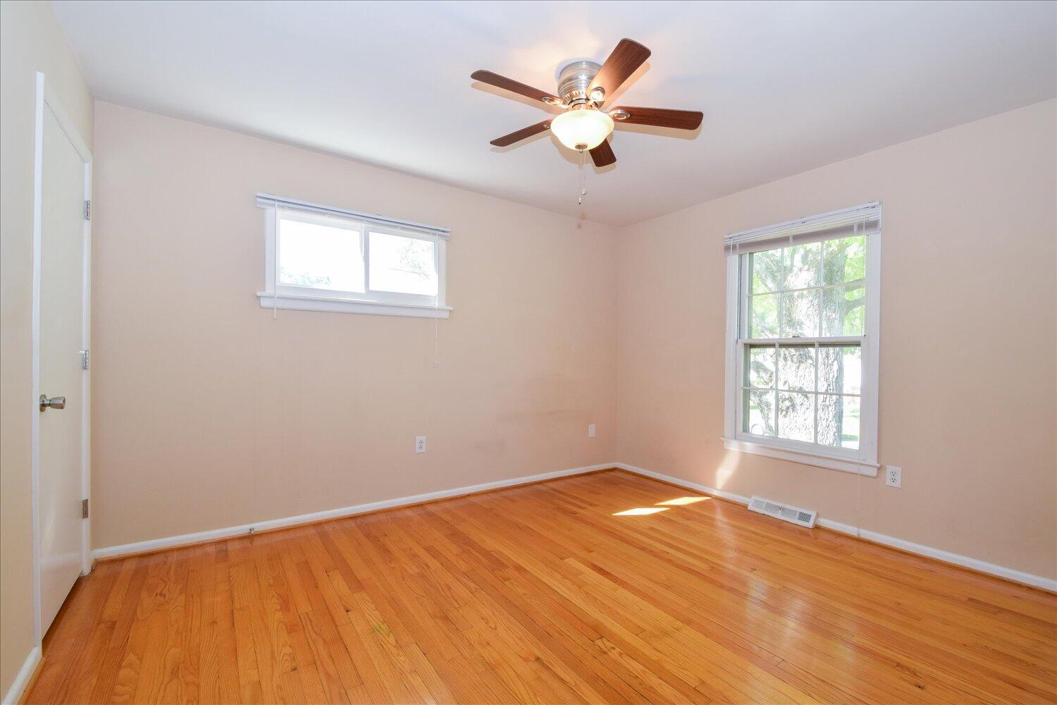 2947 Purple Finch Road Roanoke, VA 24018 - Photo 12 of 31 a view of a big room with wooden floor and windows
