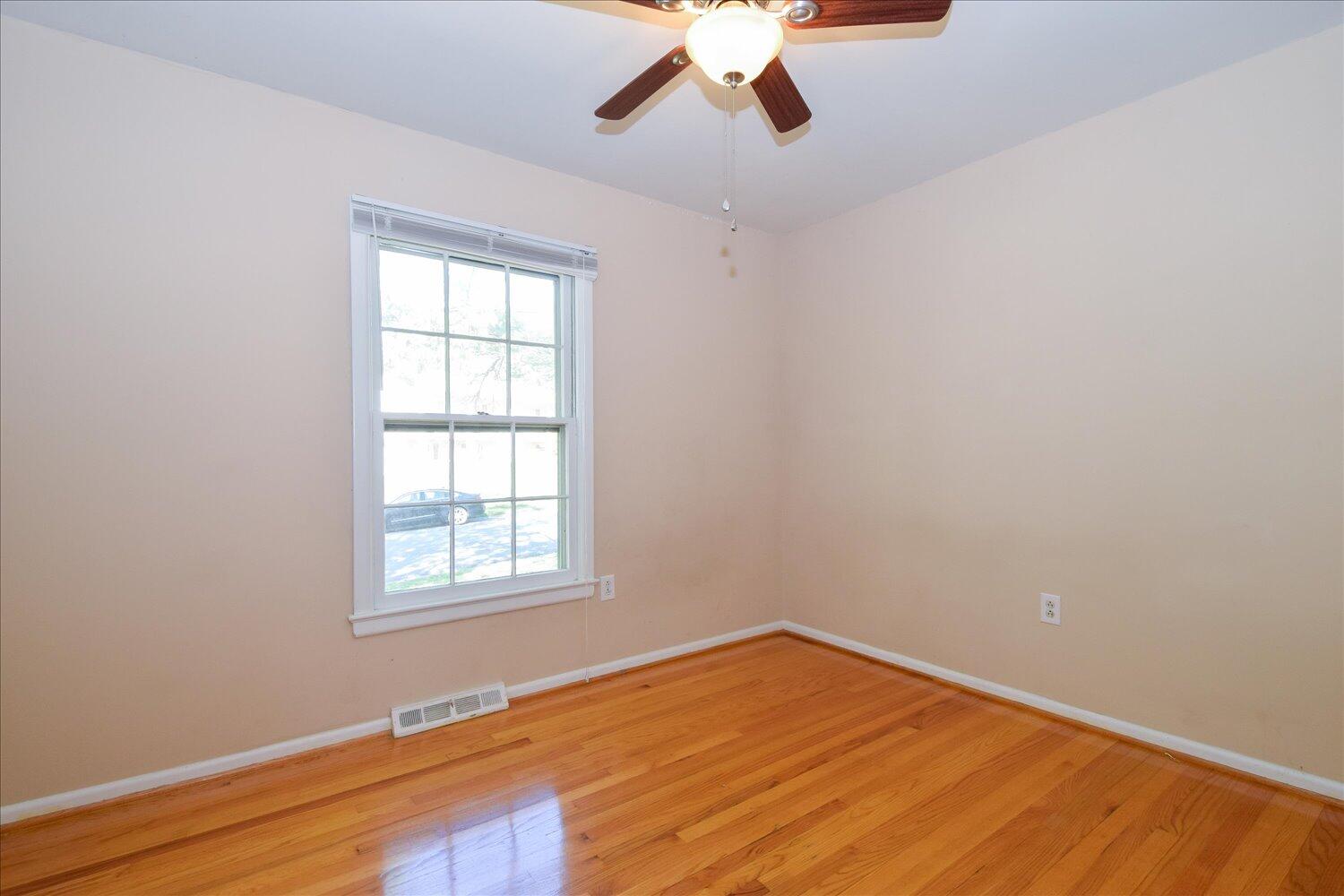 2947 Purple Finch Road Roanoke, VA 24018 - Photo 13 of 31 an empty room with a window and ceiling fan