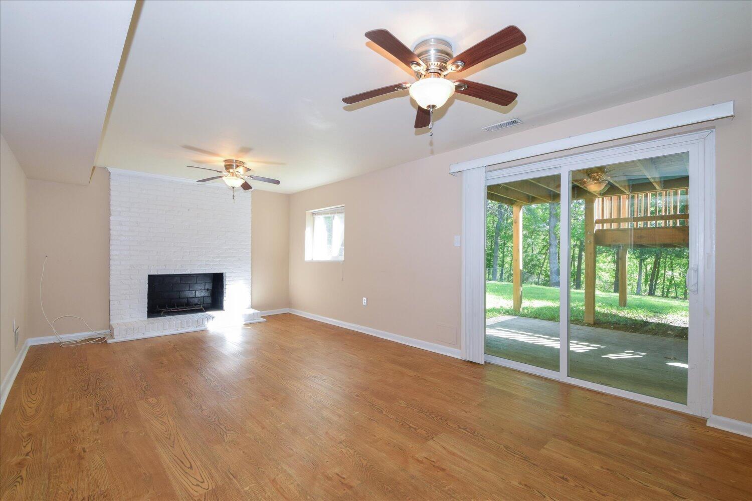 2947 Purple Finch Road Roanoke, VA 24018 - Photo 15 of 31 a view of an empty room with a window and a kitchen