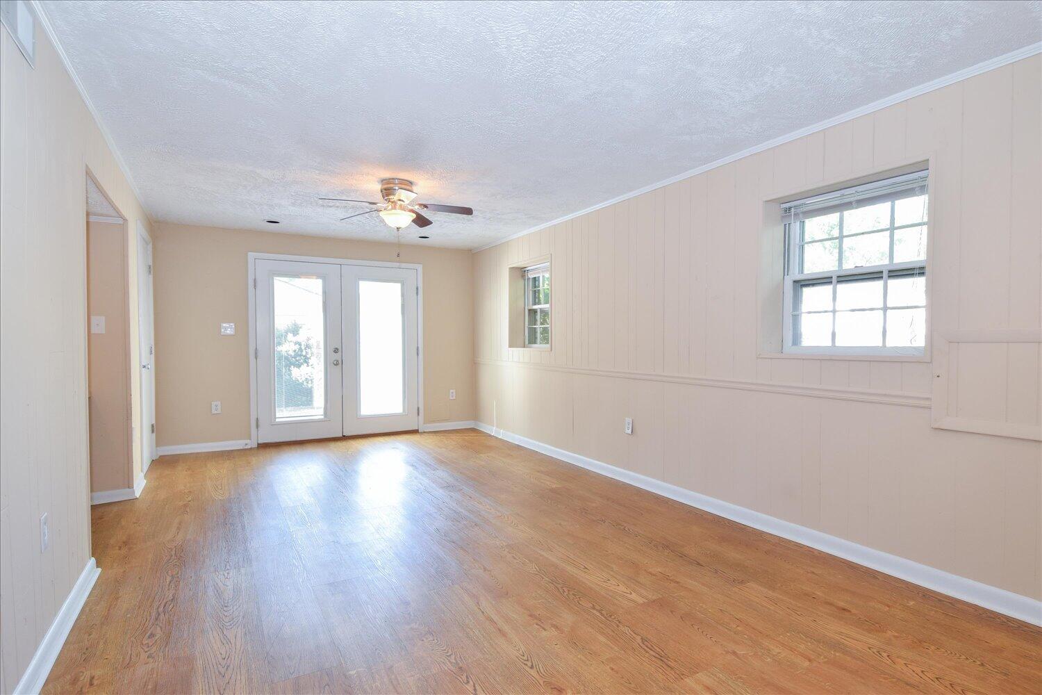 2947 Purple Finch Road Roanoke, VA 24018 - Photo 18 of 31 wooden floor in an empty room with a window