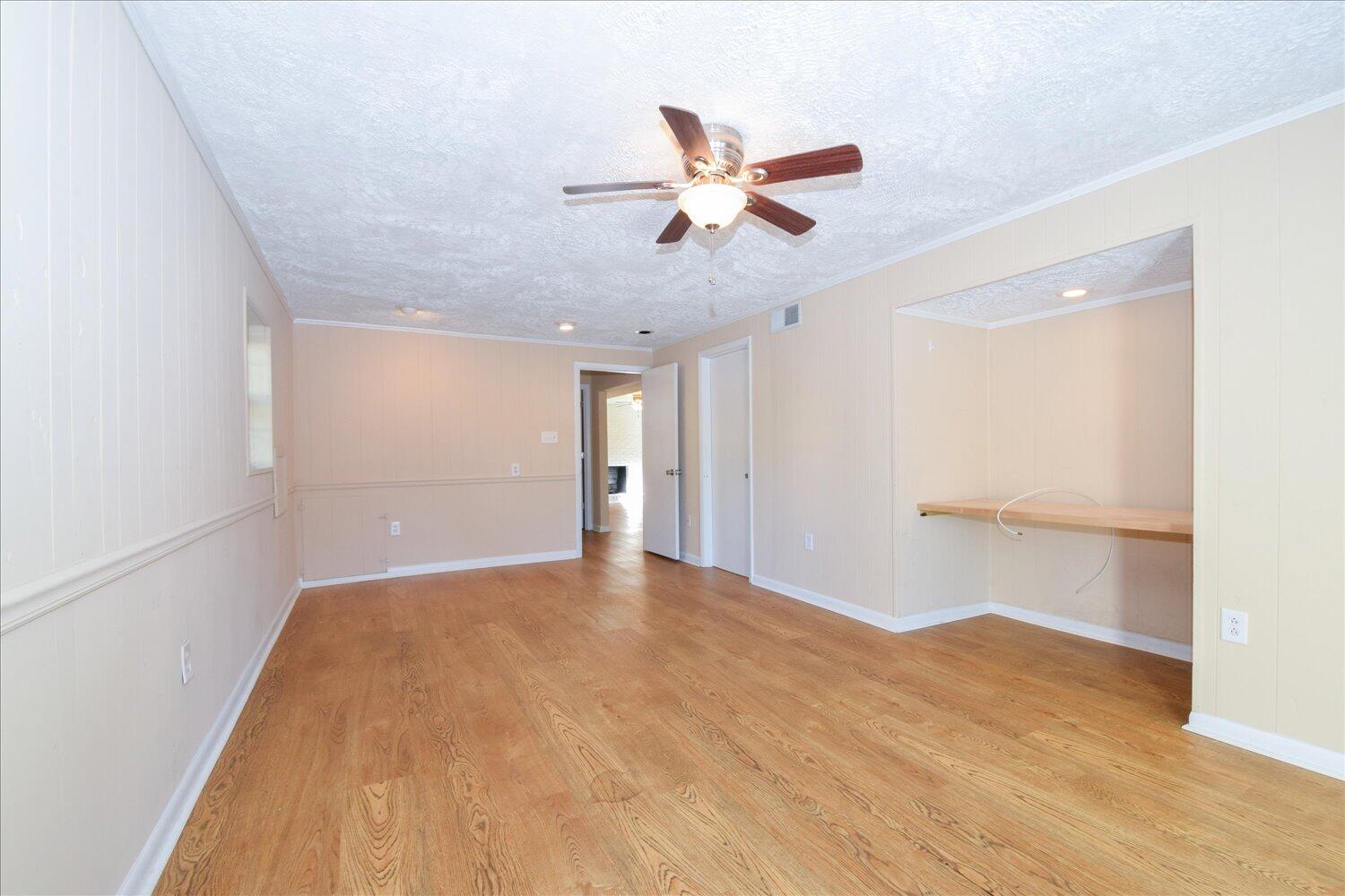2947 Purple Finch Road Roanoke, VA 24018 - Photo 19 of 31 a view of a room with wooden floor and ceiling fan