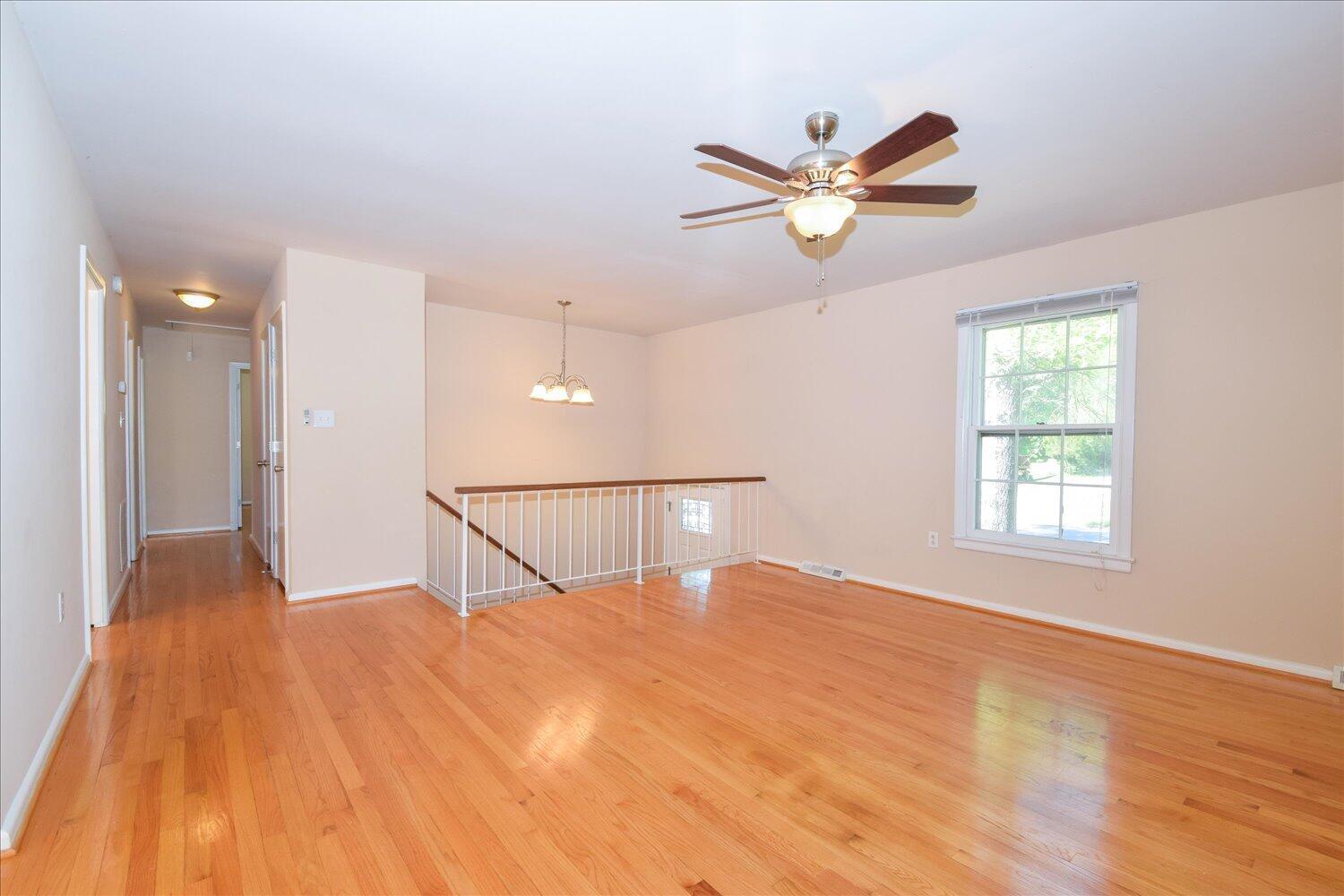 2947 Purple Finch Road Roanoke, VA 24018 - Photo 2 of 31 a view of a livingroom with a ceiling fan and window