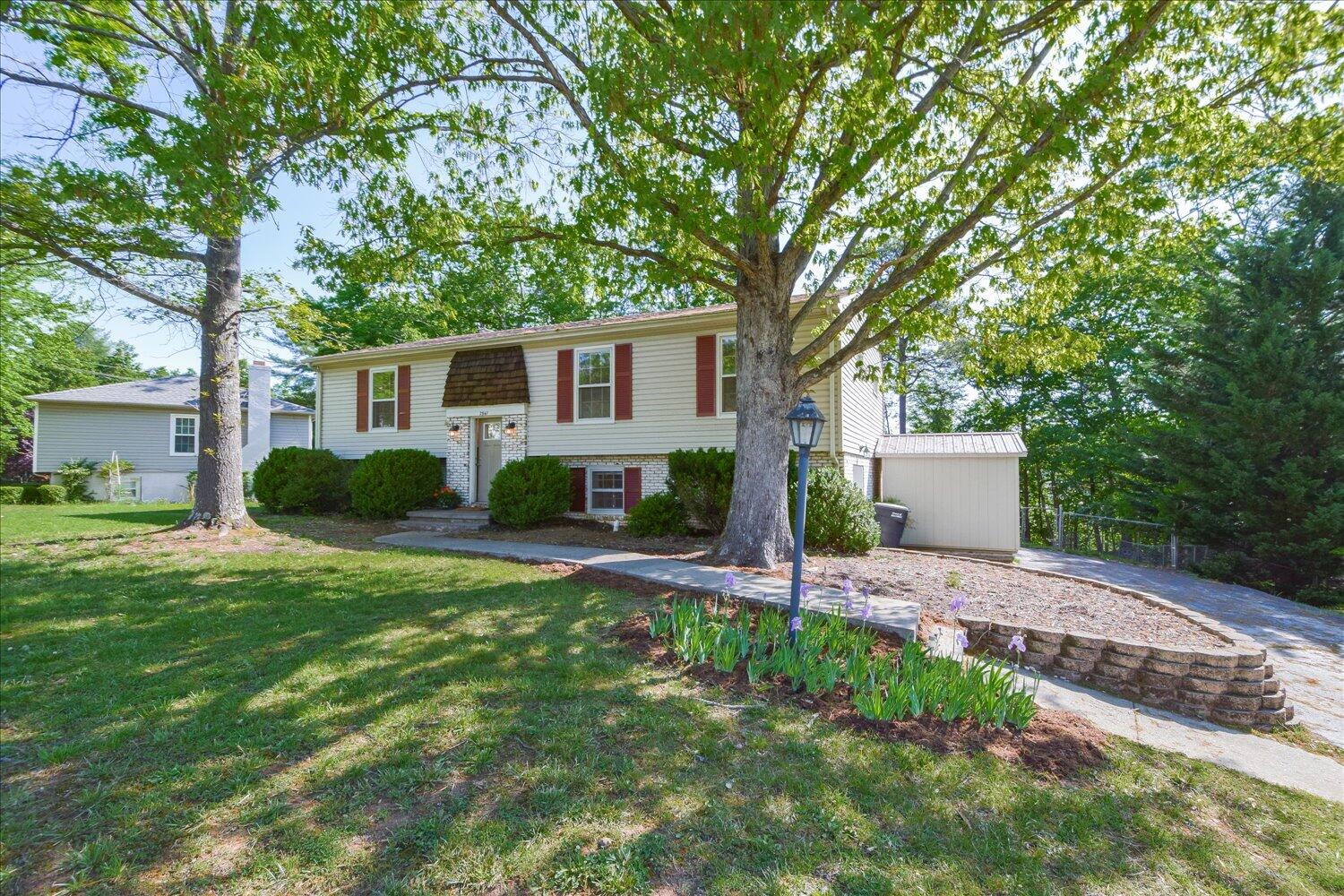 2947 Purple Finch Road Roanoke, VA 24018 - Photo 21 of 31 a house that has a tree in front of the house
