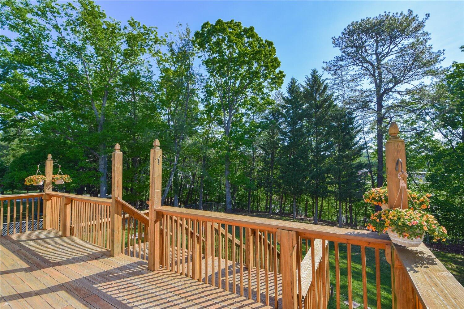 2947 Purple Finch Road Roanoke, VA 24018 - Photo 28 of 31 a view of a wooden deck next to a yard