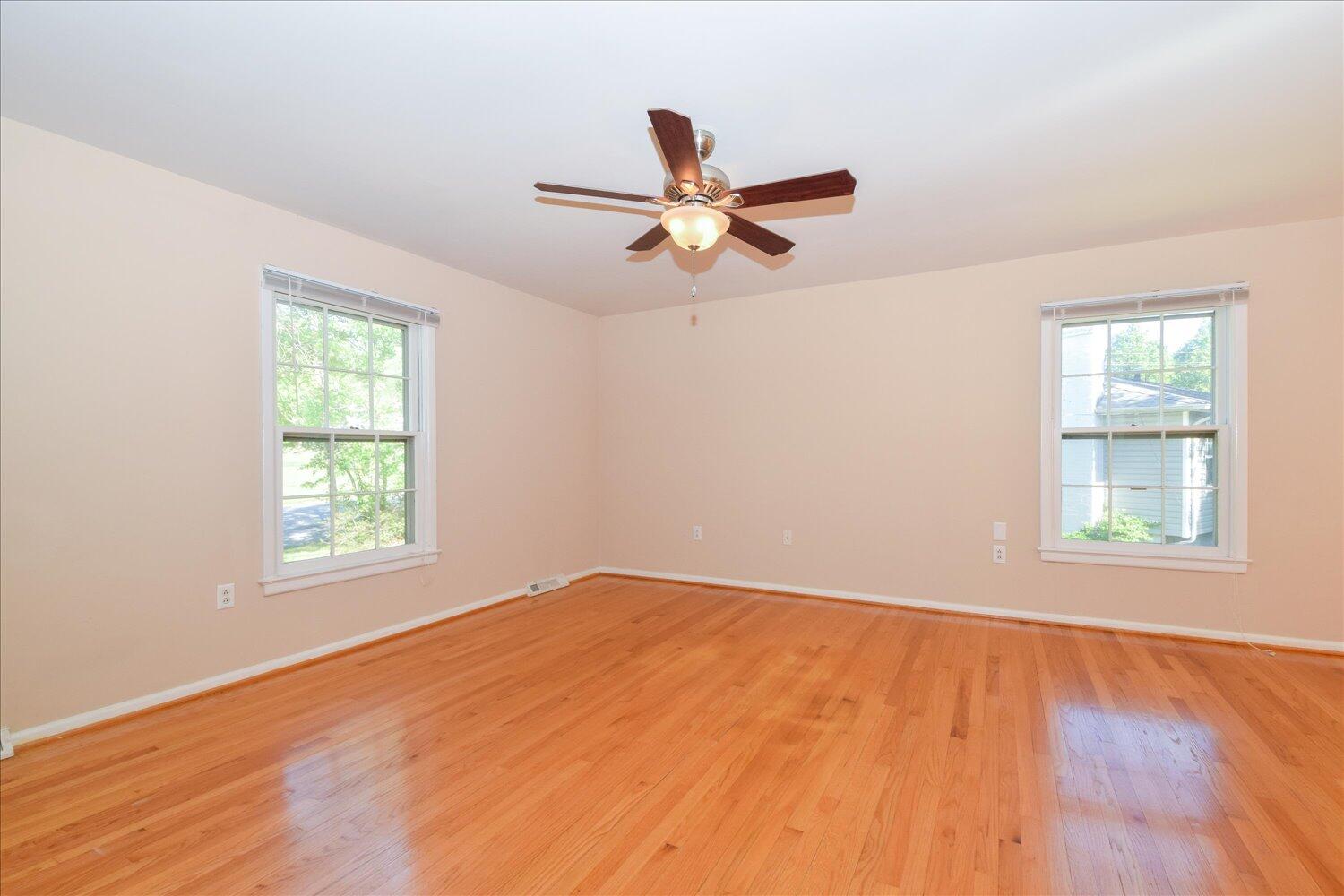 2947 Purple Finch Road Roanoke, VA 24018 - Photo 4 of 31 wooden floor in an empty room with a window