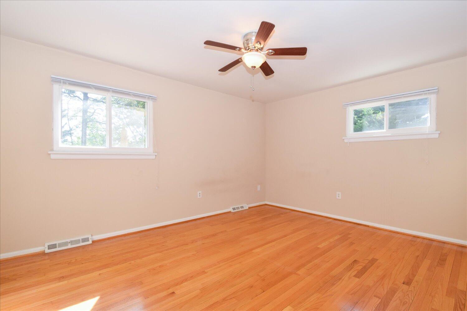 2947 Purple Finch Road Roanoke, VA 24018 - Photo 10 of 31 a view of a big room with wooden floor and a window