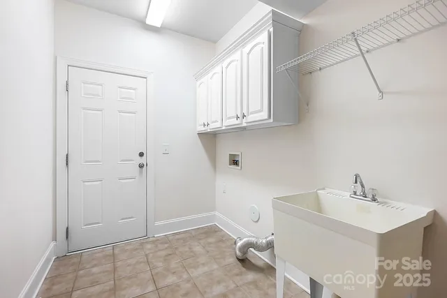 a bathroom with a sink a toilet and vanity