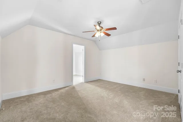 a view of a big room with carpet