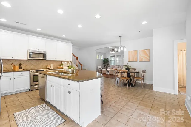 a kitchen with counter space cabinets and appliances