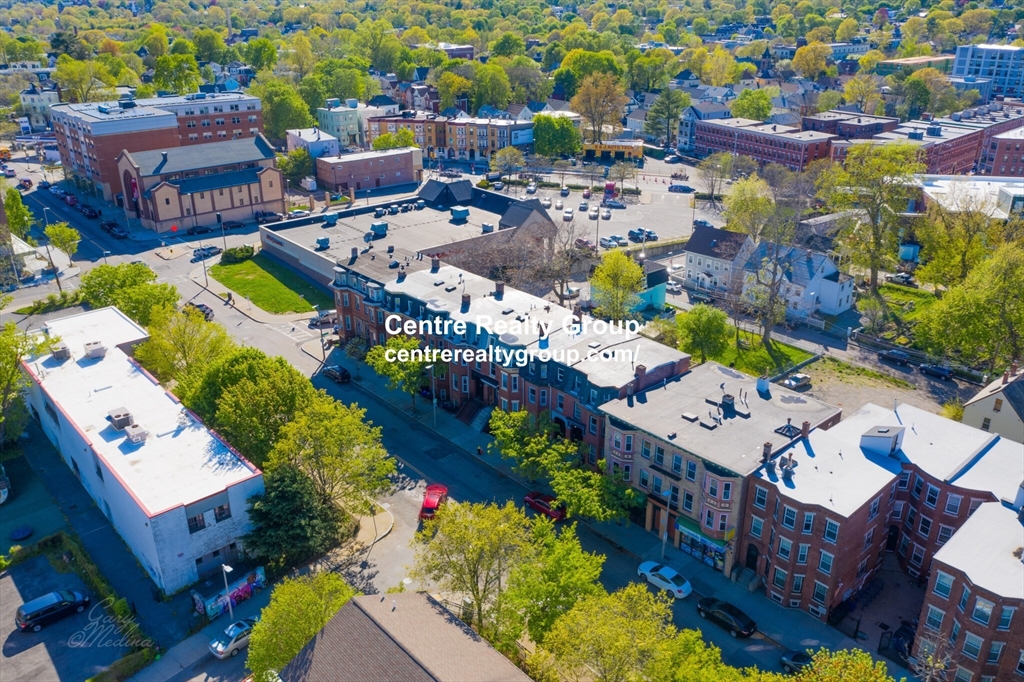 2999 Washington Street, Unit 1 Boston, MA 02119 - Photo 16 of 18 aerial view of a city with lots of residential buildings