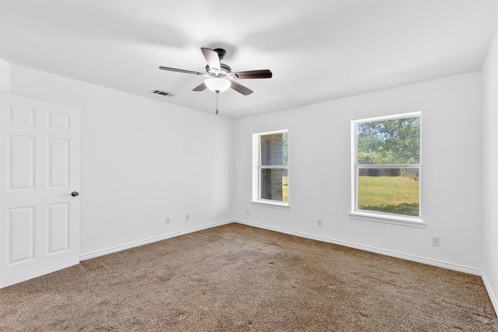 7578 Dick Price Road Mansfield, TX 76063 - Photo 11 of 40 a view of an empty room with a window