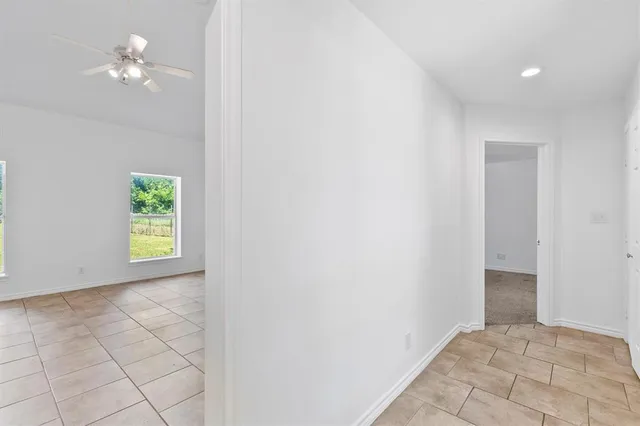 a view of an empty room and window