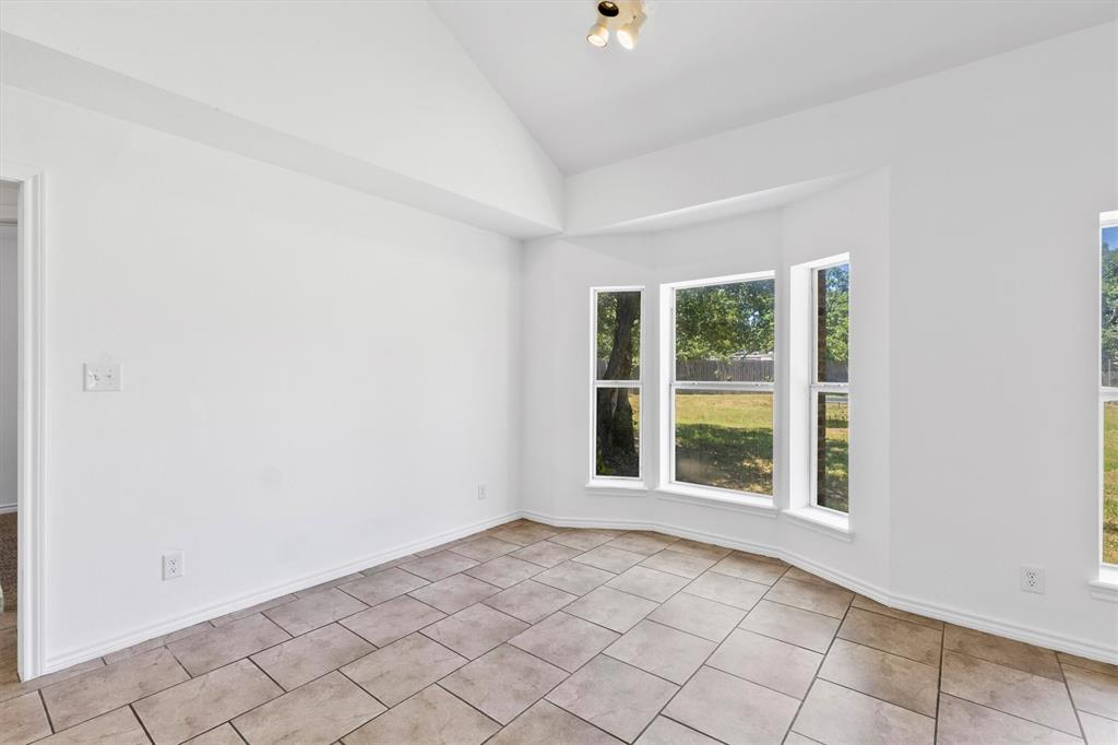 7578 Dick Price Road Mansfield, TX 76063 - Photo 22 of 40 an empty room with windows