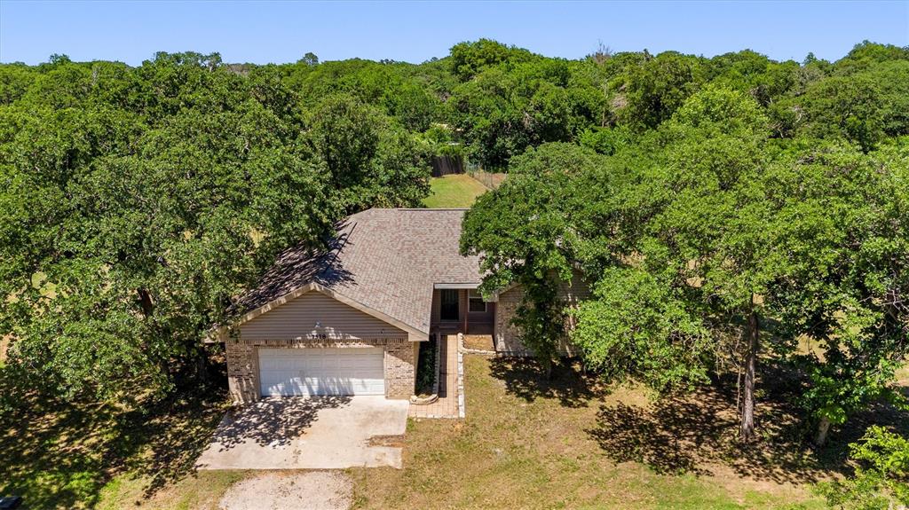 7578 Dick Price Road Mansfield, TX 76063 - Photo 33 of 40 an aerial view of a house with a yard
